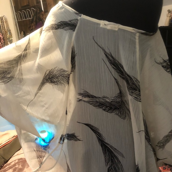 Feather poncho style top from One Clothing. OS - Picture 2 of 3